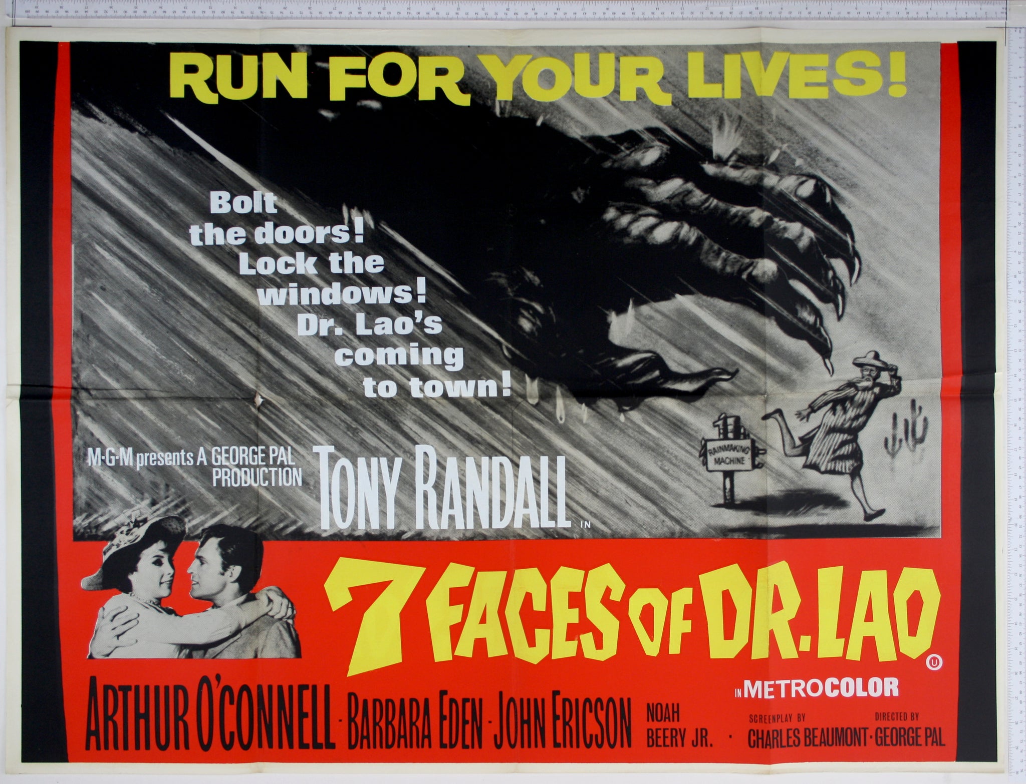 Monochrome illustration of Dr Lao running from giant hand, red lower border with yellow title