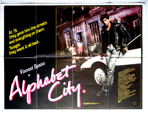 Movie poster for 'Alphabet City' featuring Vincent Spano standing next to a car on a city street at night. The tagline reads, 'At 19, they gave him the streets and everything on them. Tonight, they want it all back.'