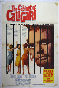 A large distorted face at right looms over three distressed female figures - the poster broken up by a series of black bar-like vertical strips.