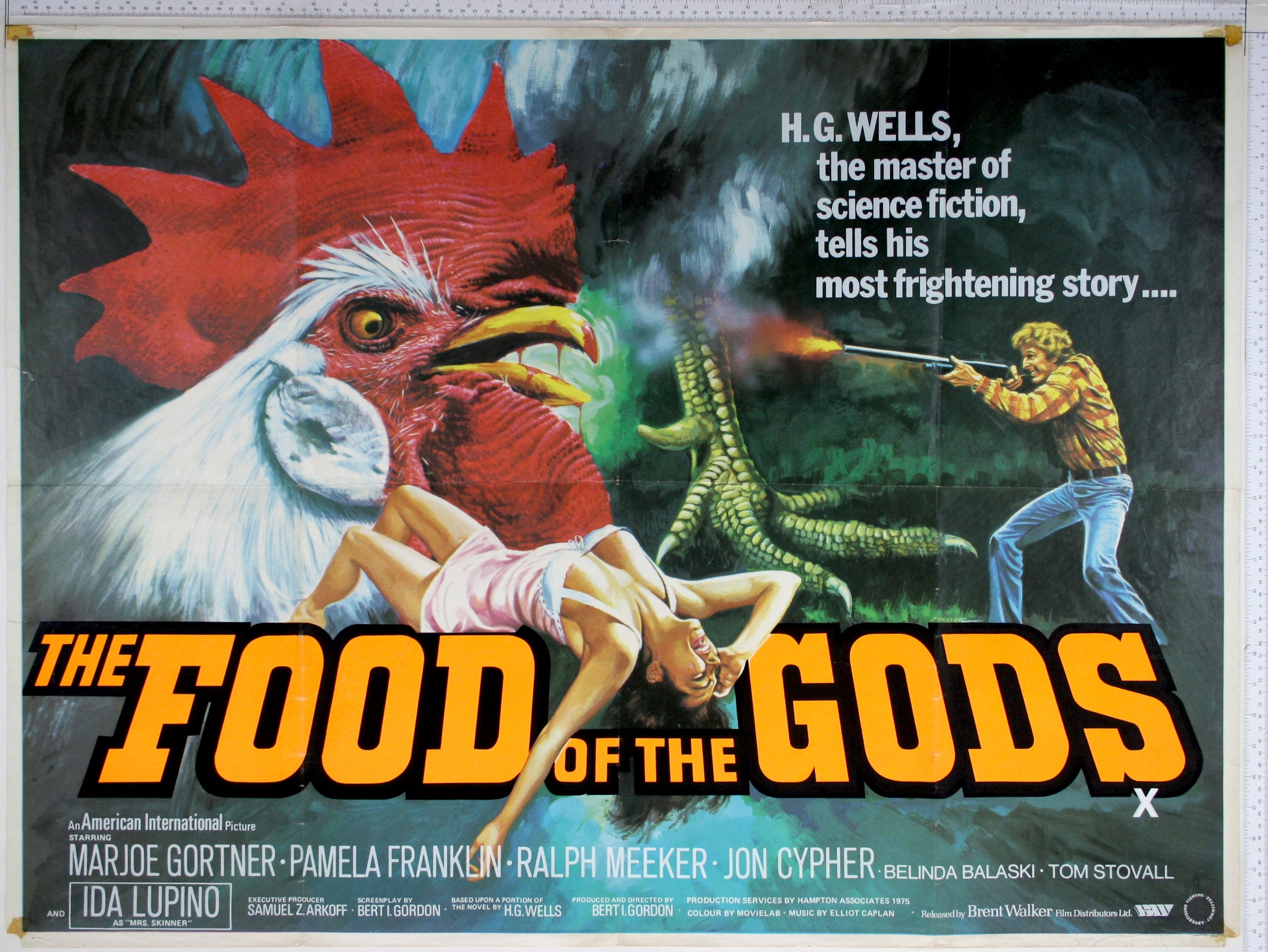 Artwork of a Giant rooster's head, blood on its beak, and in the background, its giant claw. At right a man shoots a shotgun at the monsters, while underneath, lying along the top of the title, is a screaming woman on her back.
