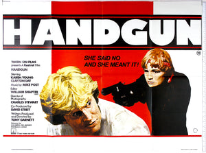 Red stripe on white, in front, artwork of short haired blonde in black holding gun on fearful man, half turned towards her.
