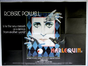Inner box with Powell's clownface, diamond patterns and reaching hands, with blood and gun. Multi-coloured title with lightning.