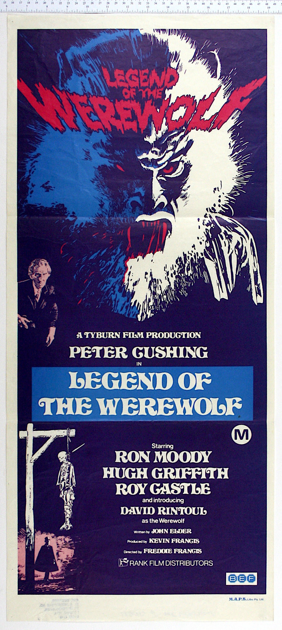 High contrast artwork of werewolf on blue, with red fangs, eyes and title. Under, Cushing and gibbet with hanged skeleton.