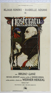 In shaped inset, artwork of bald vampire holding young dark-haired girl, through arch a boat flounders , castle behind.