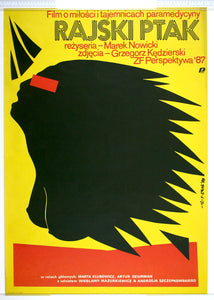 On yellow, graphic artwork of spike-haired naked female head and shoulders in black, red band over eyes.
