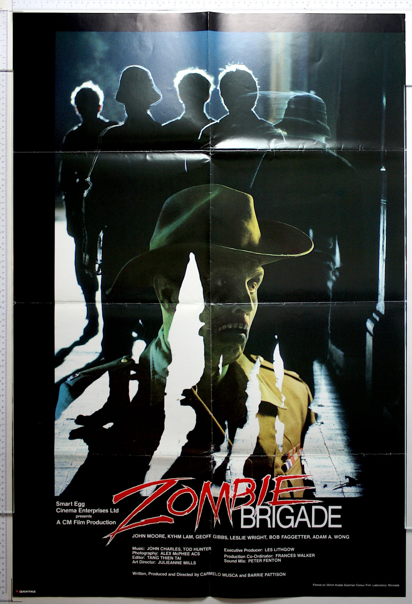 Photo of backlit zombies, with zombie soldier superimposed over.